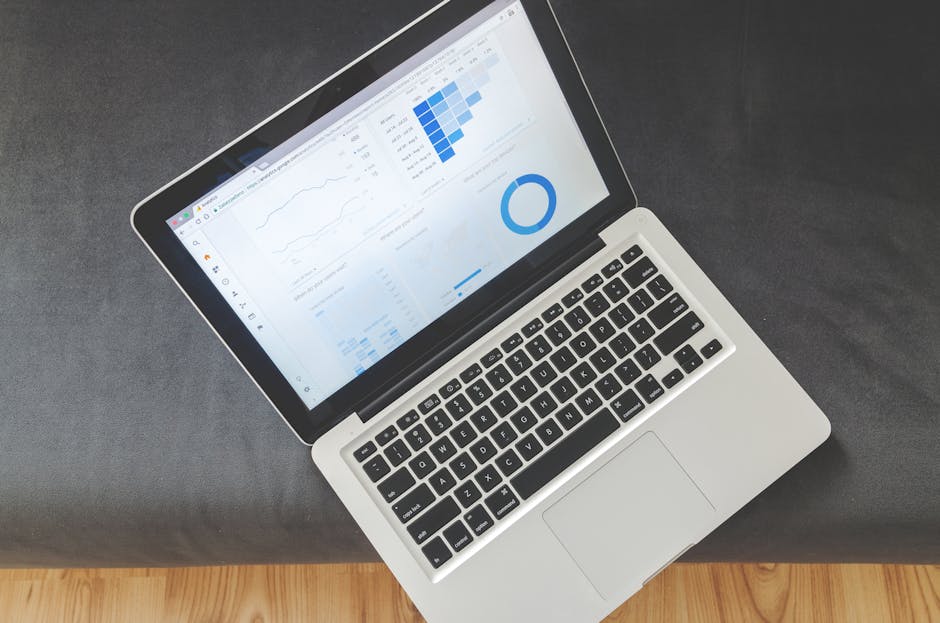 Marketer looking at data dashboard with analytics visualizations - google ads data manager